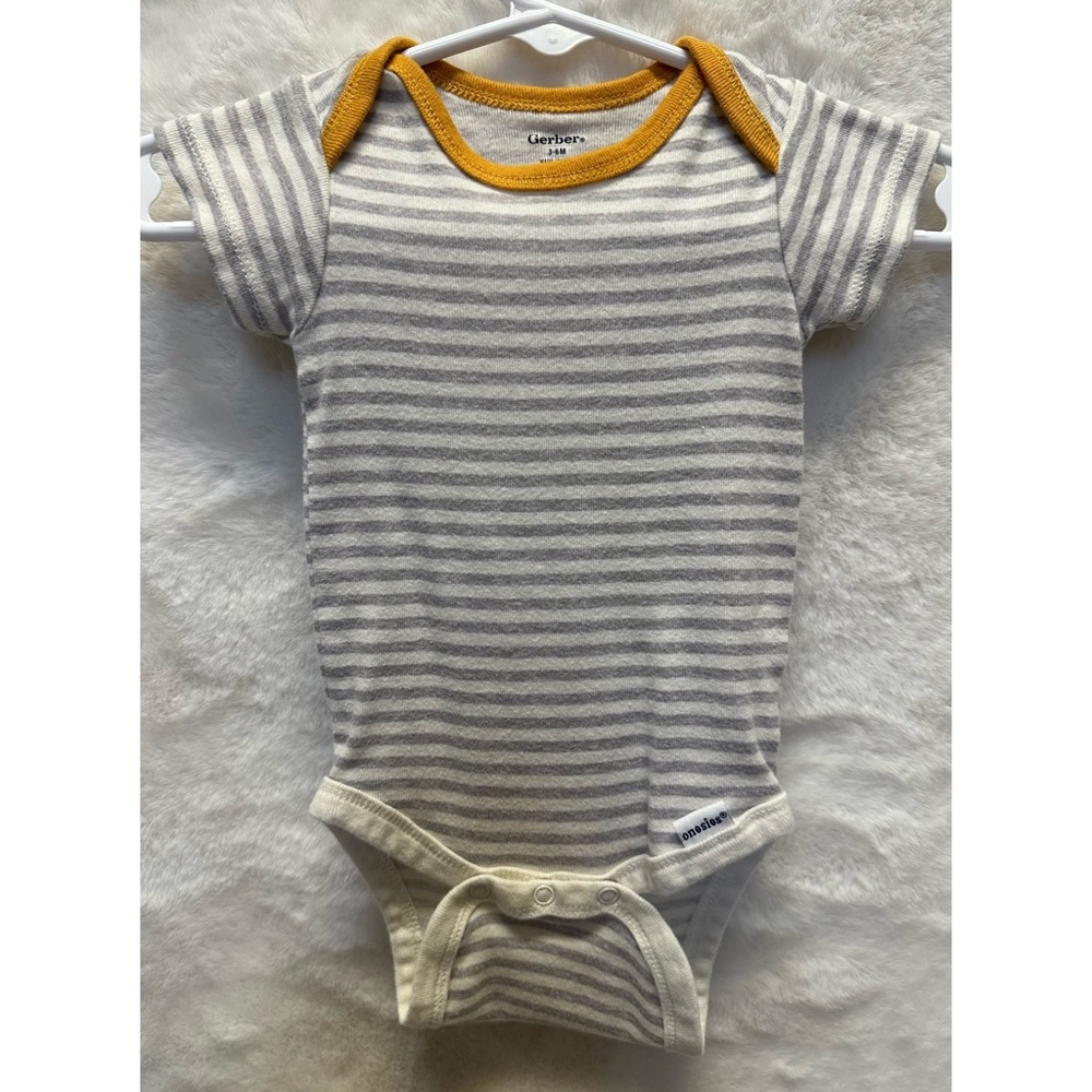 Assorted onesies. - Picture 4 of 8